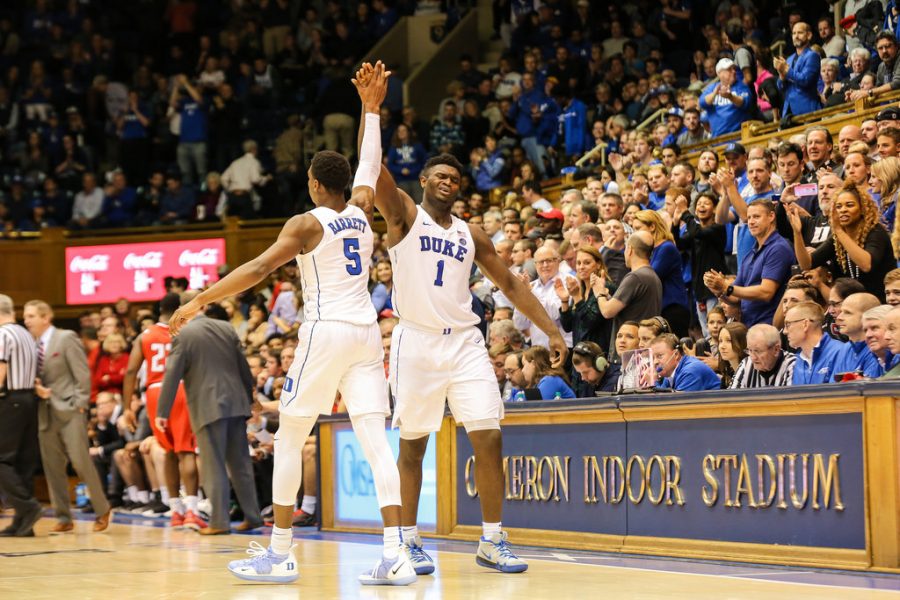 Zion Williamson and RJ Barrett celebrating