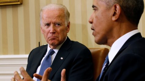 U.S. Vice President Joe Biden listens as U.S. President Barack Obama speaks about the release of the Cancer Moonshot Report at the White House in Washington October 17, 2016.REUTERS/Kevin Lamarque - RTX2P85D