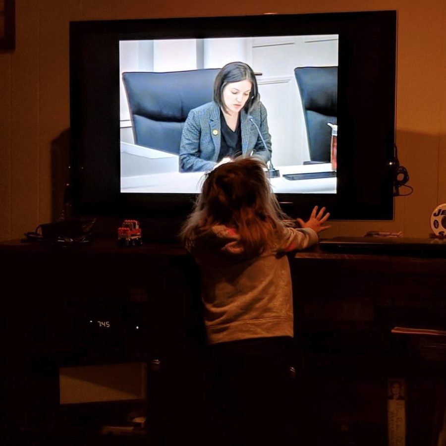Mrs. Cutrones daughter watching her at a council meeting on TV