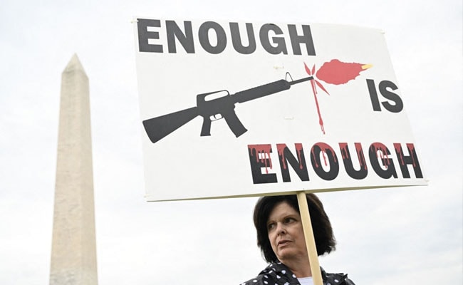 Still image of an anti-gun rally.