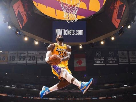 Lebron James does his one of most famous dunks of his career. 