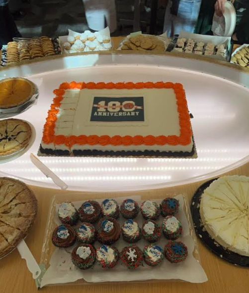 100 year anniversary cake along side other desserts at the Luncheon 