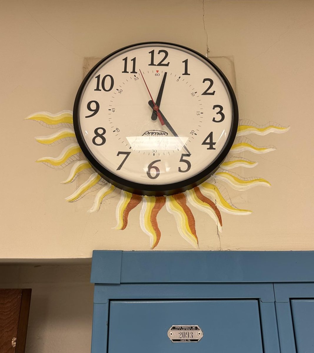 Clock outside Room 215