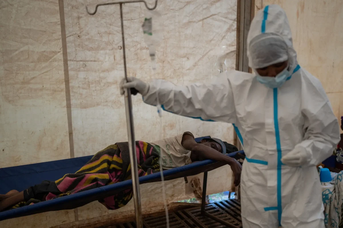 In Malawi, a cholera patient is treated in an isolation tent to prevent this highly contagious disease from spreading. 