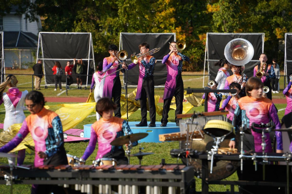 A shot of the trombone soloists -- Siddhant Sharma ('27), Max Goldberg ('27), and Nate Gallione ('26) -- in a key part of the show!