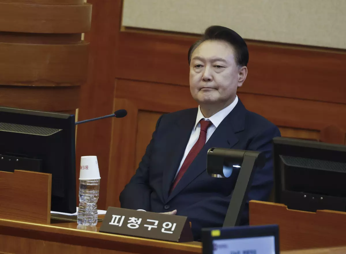 President Yoon at the fourth impeachment hearing at the Constitutional Court over his six-hour martial law.
