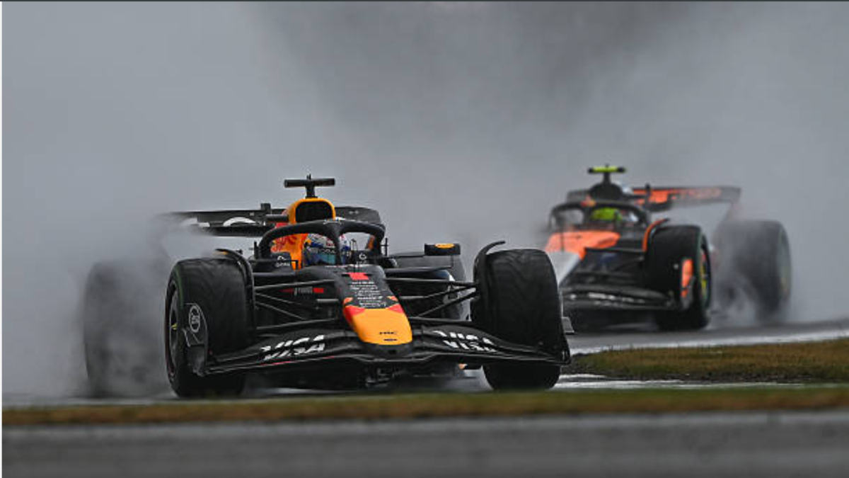 Max Verstappen being chased by Lando Norris in Silverstone 2025