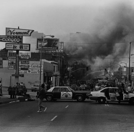Courtesy of Wikimedia Commons: https://commons.wikimedia.org/wiki/File:900_block_of_Vermont_Avenue_in_Koreatown,_just_north_of_San_Marino_Street,_where_police_blocked_off_the_street_so_firemen_could_put_out_fires_in_several_torched_apartments.jpg