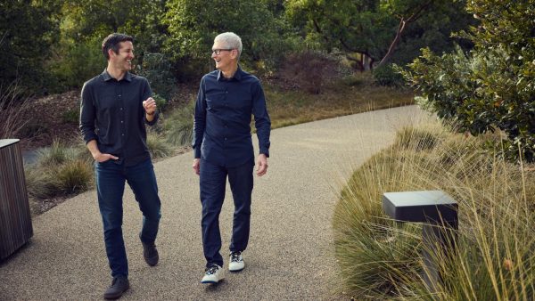 John Turnus Speaking with Tim Cook